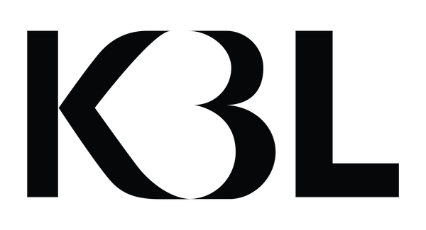 Kissed By Love logo
